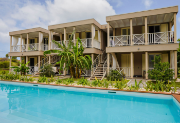 Own at Passion Village, Antigua’s boutique residential resort. From USD $315,000, enjoy full freehold ownership with Italian design, beach access, and strong rental appeal.